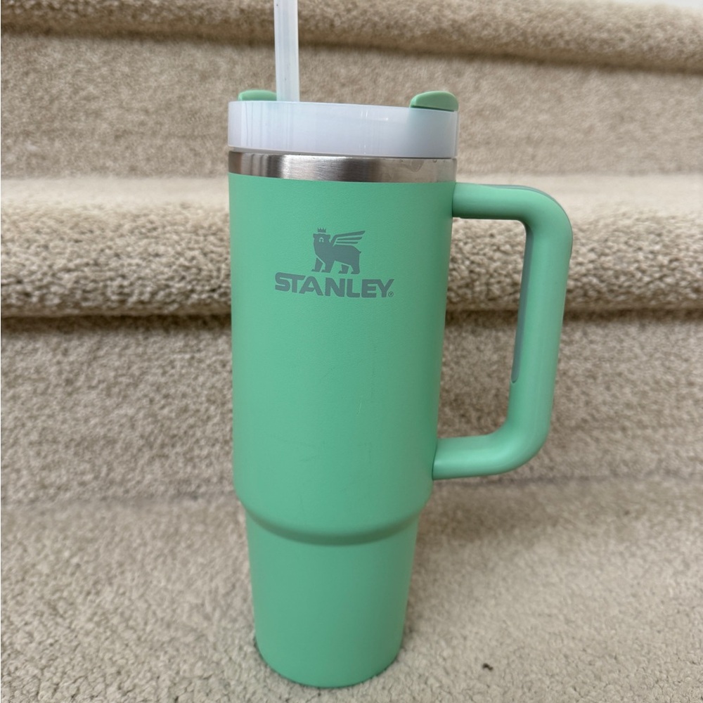 Gently used Stanley Tumbler in Jade Green 30 oz. Comes with straw.